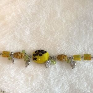 Lot of 3 glass & metal necklaces in a 22” length